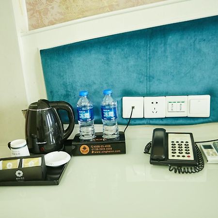 Xinghe Xinfeng Hotel Canton Esterno foto