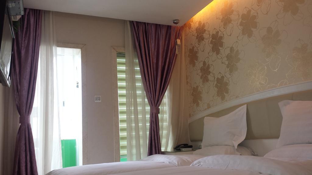 Xinghe Xinfeng Hotel Canton Esterno foto