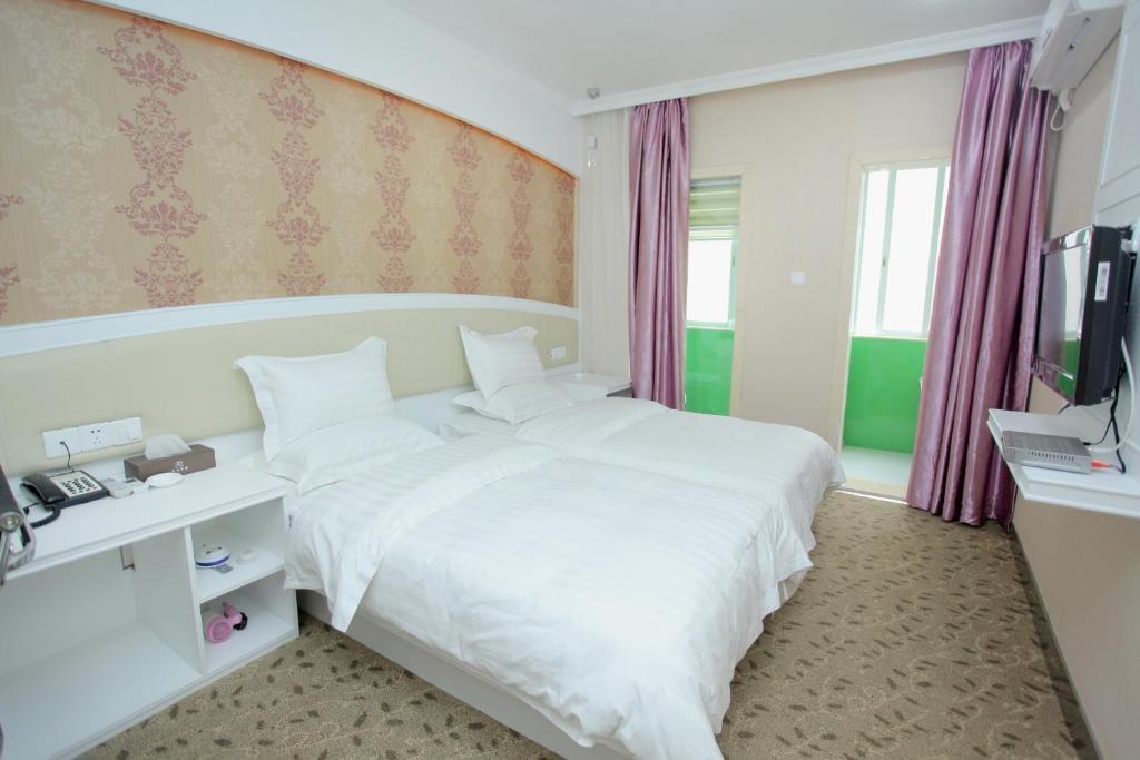 Xinghe Xinfeng Hotel Canton Camera foto