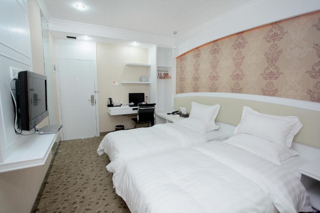 Xinghe Xinfeng Hotel Canton Camera foto