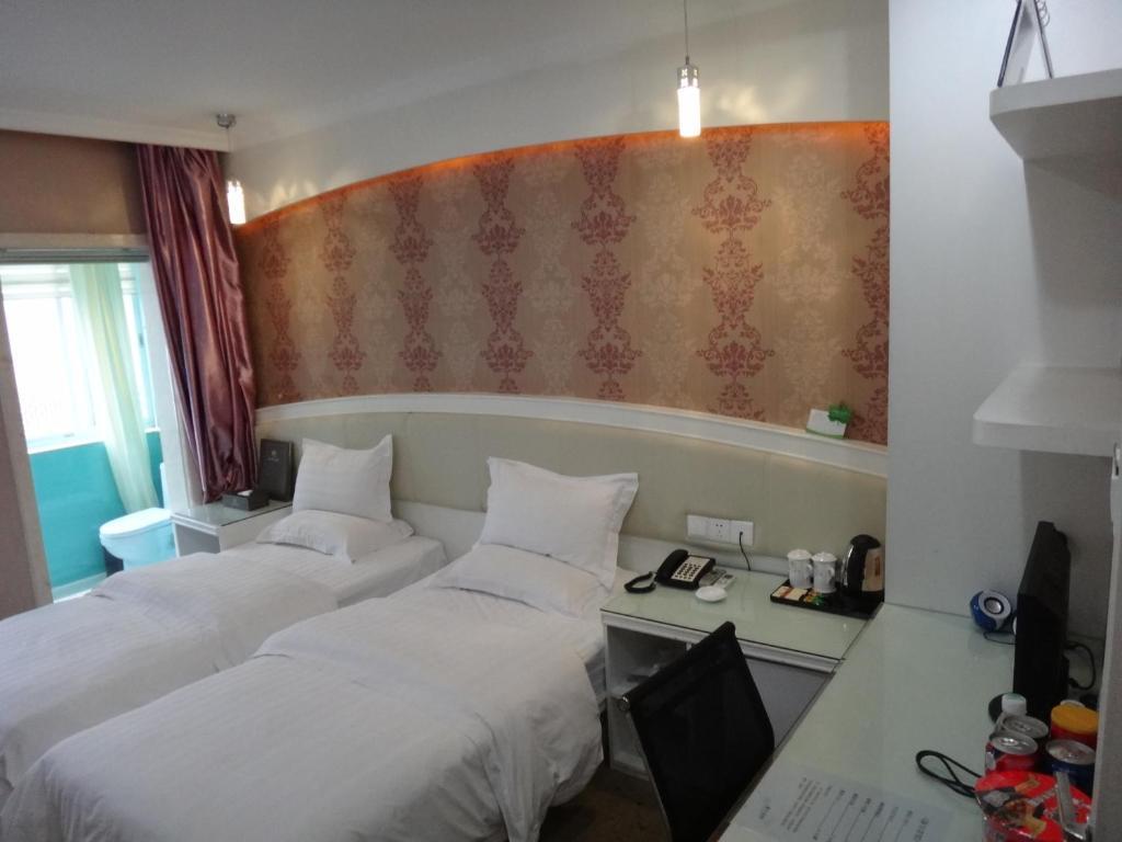 Xinghe Xinfeng Hotel Canton Esterno foto