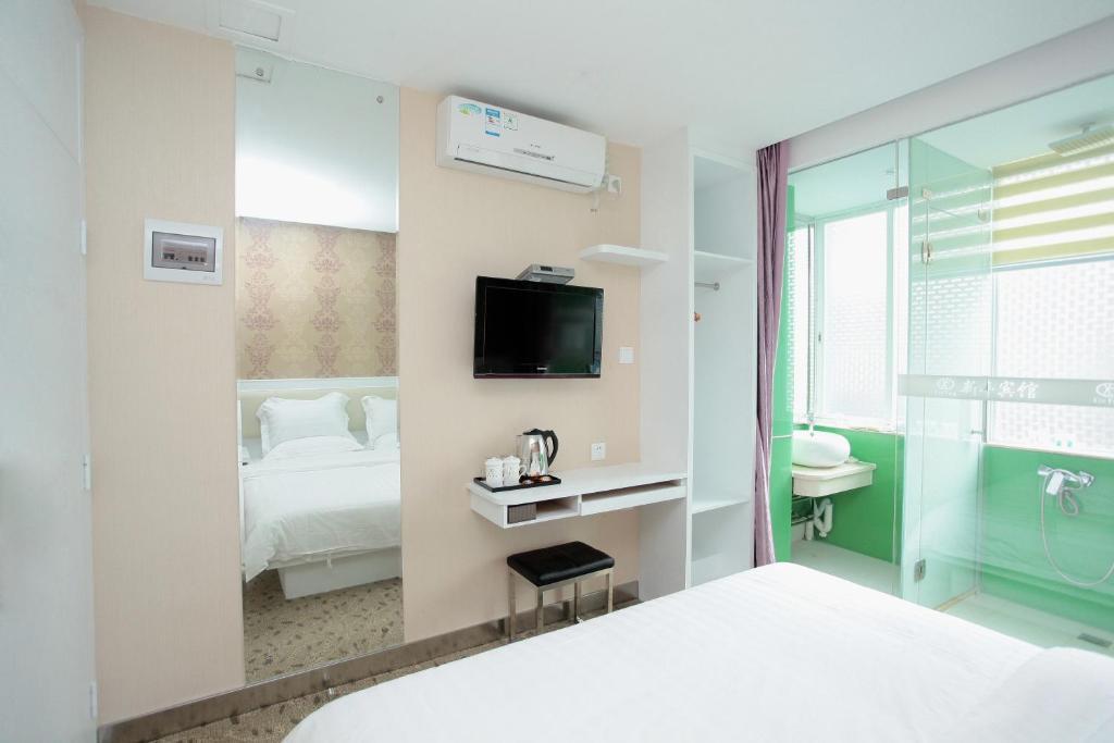 Xinghe Xinfeng Hotel Canton Camera foto