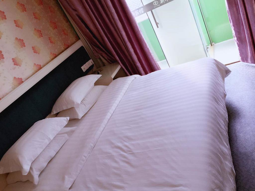 Xinghe Xinfeng Hotel Canton Esterno foto