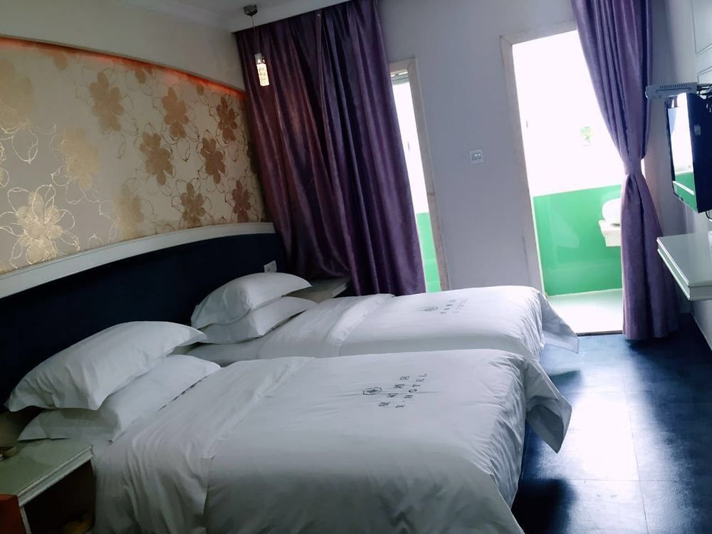 Xinghe Xinfeng Hotel Canton Esterno foto
