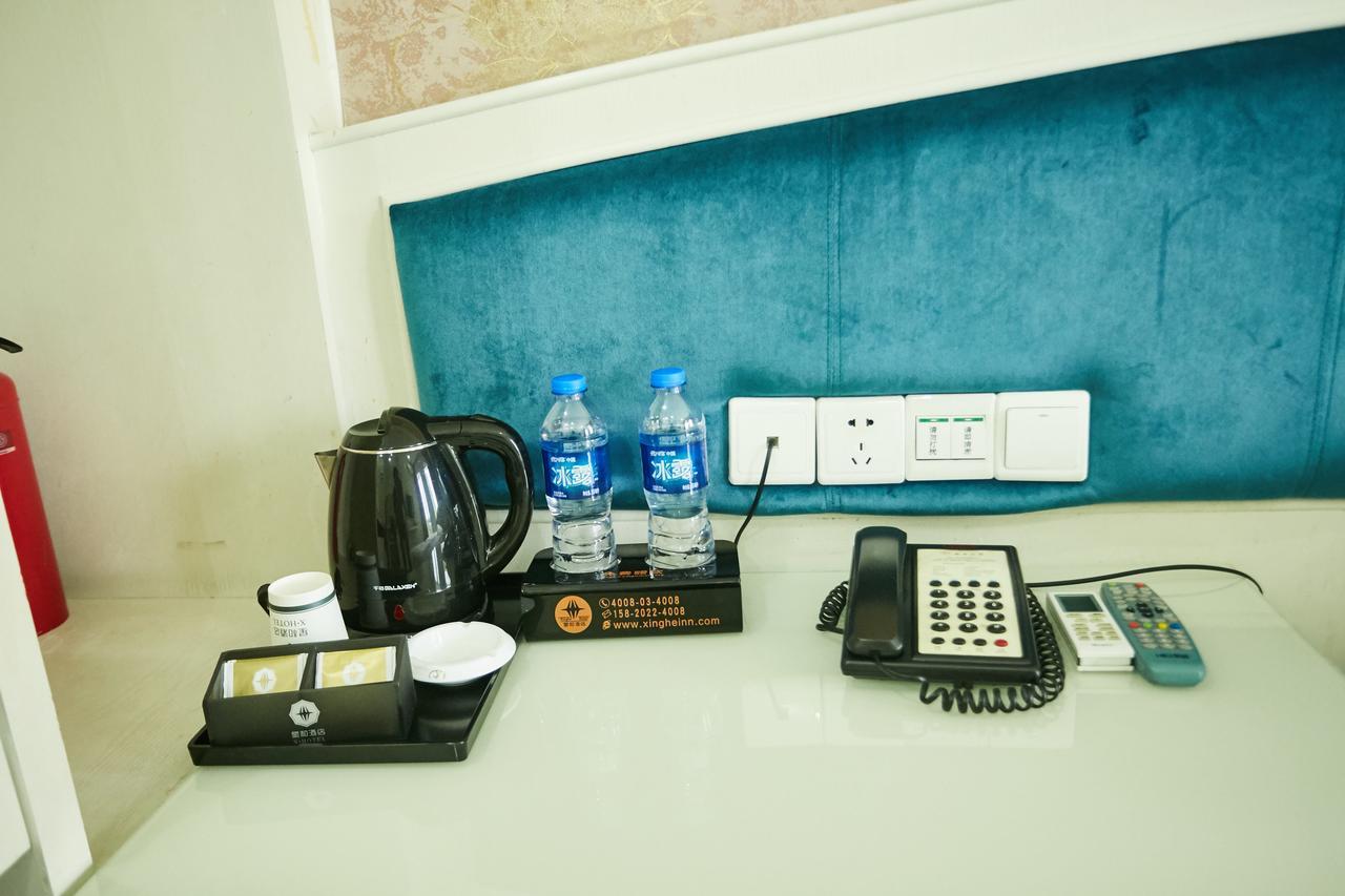 Xinghe Xinfeng Hotel Canton Esterno foto