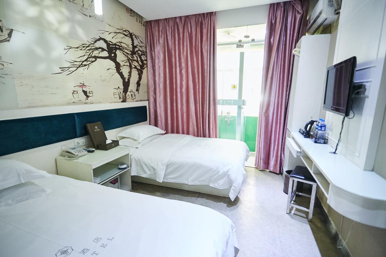 Xinghe Xinfeng Hotel Canton Esterno foto